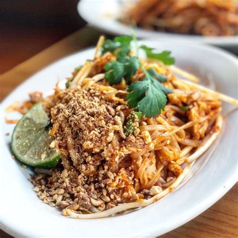 Siri thai cuisine - Thai Style noodle dish with strong flavor. It contains choice of Beef or Pork as well as dark soy sauce, pickled bean curd, some spices and it served with meatballs and crispy pork skin $ 12.95